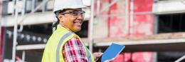 Resources, femal construction work, holding tablet