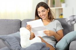 Payments, worker reading letter